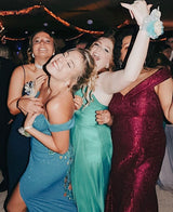 4 XO Babes rocking their prom dresses and dancing at prom